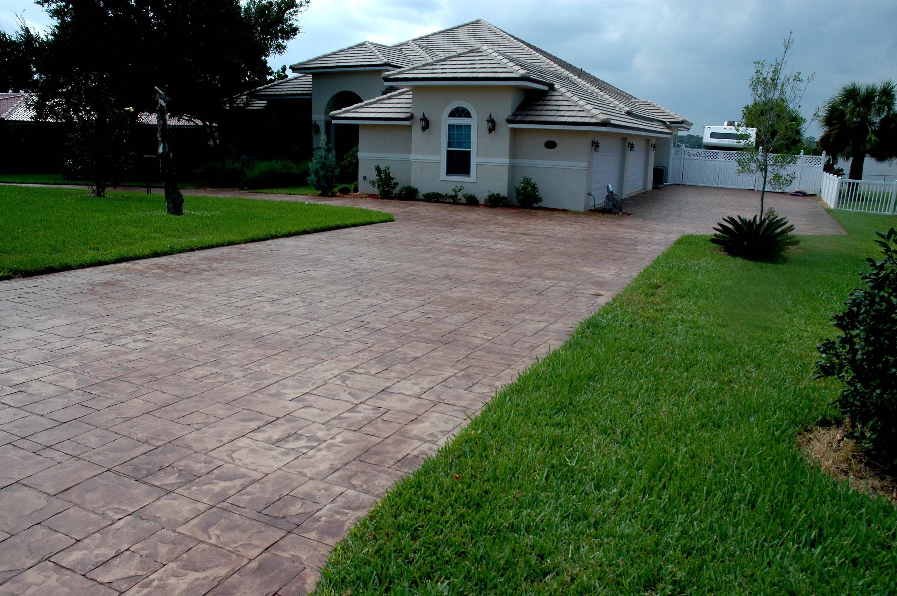 Modern home driveway with landscaping